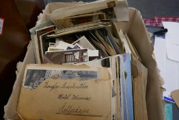 A box of Victorian and later postcards, many hundreds