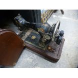 A cased Singer sewing machine F9237846 and a Remington vintage typewriter and box of chinaware to in