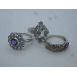 Three modern 9ct white gold dress rings to include amethyst flower leaf design ex, marked 375, 10.5g