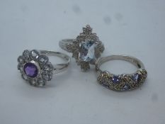 Three modern 9ct white gold dress rings to include amethyst flower leaf design ex, marked 375, 10.5g