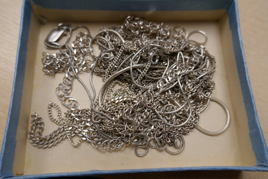 A small collection of mixed silver chains