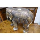 A bronzed style oriental elephant sculpture, height 42cm