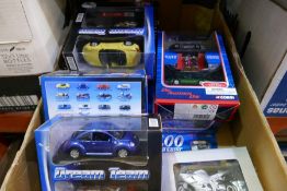 A box of Die Cast models, some by Corgi to include 007 model