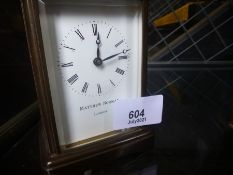 Small brass carriage clock by Matthew Norman, London