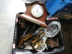 A box of miscellaneous to include mantle clock, cutlery, candle sticks, glass bowl, etc
