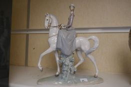 A Lladro figure of horse with female rider