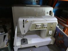 Singer 740/760 sewing machine with case, full instruction manual and boxed accessories