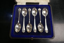 A set of six silver teaspoons in fitted case by C.B. and S., 2.5 ozs approx