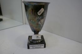 A marked white metal trophy cup on a black marble base, Coupe de Bordeaux, a French football team tr