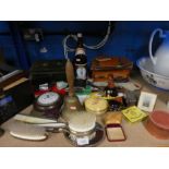A selection of various collectables including brassware, vintage boxes/tins and a bottle of Sake