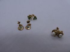 Three pairs of 9ct yellow gold stud earrings including emerald and pearl example, marked 375, approx