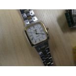 Box containing Stainless Longines wristwatch and other designer watches