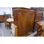 Victorian mahogany linen cupboard having pair of panelled doors on plinth base, 138cm