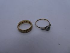 2 9ct yellow gold rings one a band set with clear stones, the other a hexagonal blue stone, AF 4g gr