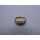 18ct yellow gold gypsy ring set with 5 graduated diamonds, size N, marked 18, 2.7g approx