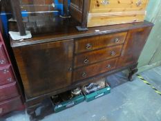 Vintage mahogany sideboard with 3 central drawers flanked cupboards on cabriole supports