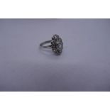 Pretty unmarked scalloped Art Deco diamond dress ring with central diamond, approx 1 carat. Some dis