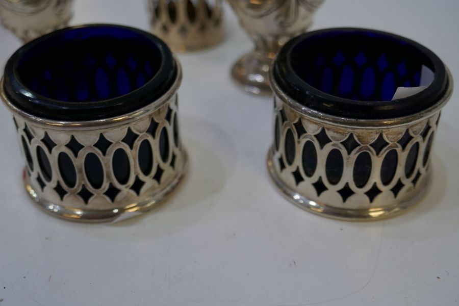 A pierced pair of two silver salts with Bristol blue inset, and a pair of decorative, pretty and orn - Image 6 of 7