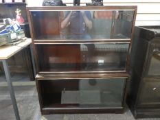 Vintage 'Minty' three sectional stacking bookcase with sliding doors