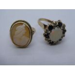 Two 9ct yellow gold dress rings, one set with a cameo and the other an opal cluster example, marked