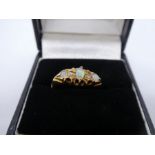 18ct yellow gold dress ring set with white opals and diamonds, size P, marked 18, 2.6g approx