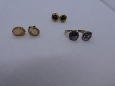 Three pairs of 9ct yellow gold stud earrings to include cameo and amethyst example, all marked, gros