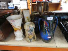 Pottery glazed vases depicting parrots, large pottery jugs, model rabbits, copper embossed slipper b