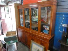 Large display dresser with glazed doors above drawers and cupboards