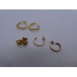 Two pairs of 9ct gold hoop earrings and a pair of 9ct gold studs, all marked, weight 3.5g approx