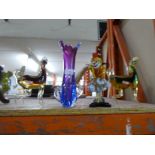 Four Murano style glass pieces to include vase, clown and horses