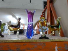 Four Murano style glass pieces to include vase, clown and horses