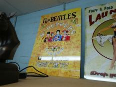 Large 'The Beatles' signs