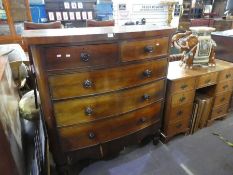 Victorian mahogany bow fronted chest with two short over three long drawers, on turned supports