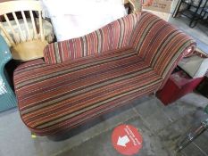 Vintage chaise longue upholstered in red stripped fabric and a matching bedroom chair