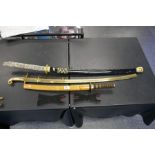 A officers mameluke sabre. reproduction Japanese Samurai sword, a similar short sword