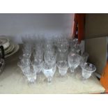 A selection of cut glass wine and tumbler glasses