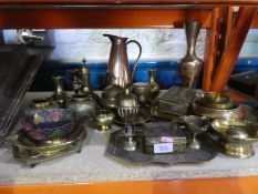 A quantity of brass and copper items to include jugs, vases, trinket boxes, etc