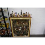Display cabinet containing approx 300 alcohol miniatures to include a number of decorative and china
