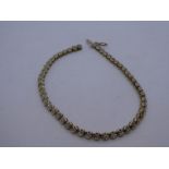9ct yellow gold tennis bracelet, set with clear, possibly diamond chips, marked 375 on clasp, approx
