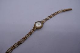 Vintage 9ct yellow gold ladies wristwatch, marked 375 on watch and strap, 10.9g approx