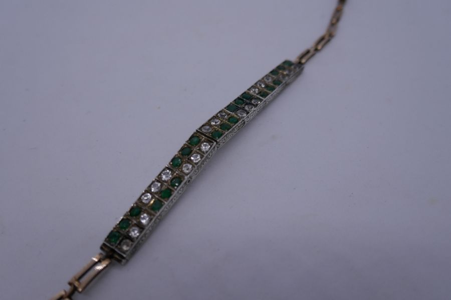 Antique two tone bracelet with articulated white panels set emeralds and possibly white sapphires on - Image 2 of 3