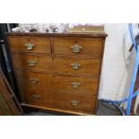 An antique mahogany chest having two short and three long drawers, 99cms