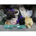 A box of well loved teddy bears and toy Scottie dogs, doll and a golly