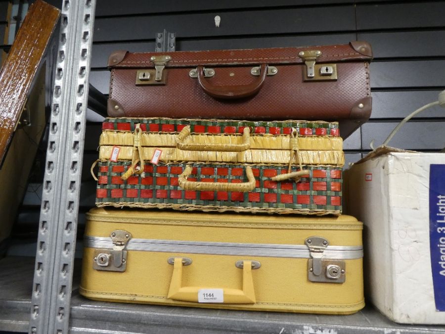 Selection of vintage cases and picnic baskets
