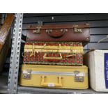 Selection of vintage cases and picnic baskets