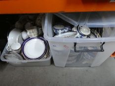 Two tubs containing china dinner and tea ware to include Booths 'Real Old Willow', 'Harvest' and Roy