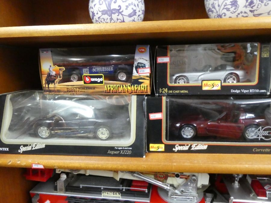 Boxed die cast model cars to include Corvette, Jaguar, Ford, Citroen, etc