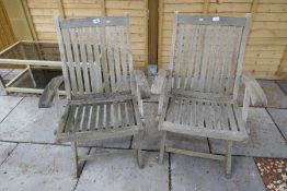 Two teak garden chairs