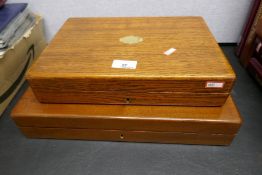 A set of twelve Victorian fruit knives and forks having Mother of Pearl handles in oak case and a se