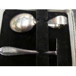 A silver Christening set and a very nice set of cased spoons, tongs and a knife 6.18ozt approx